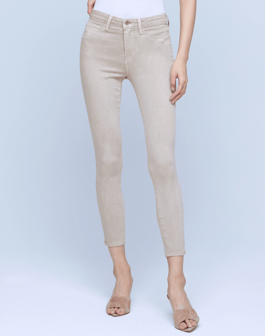 Model wearing L’AGENCE Margot High-Rise Skinny Jeans in Biscuit – high rise skinny fit